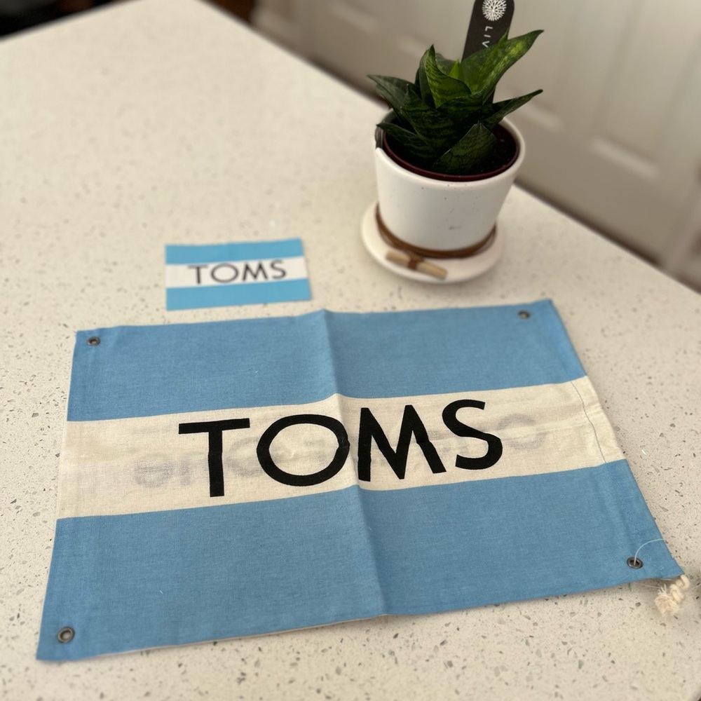 NWT Toms dust bag with sticker